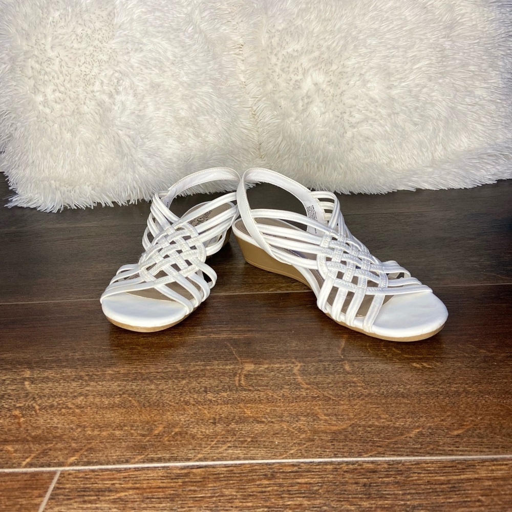 East 5th, white heeled sandals.